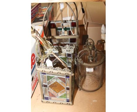 Two brass lead light lanterns together with a cut glass hanging lantern 