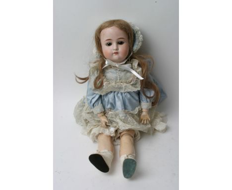 A German bisque headed doll marked 1912.3 having jointed body and shutting eyes with open mouth