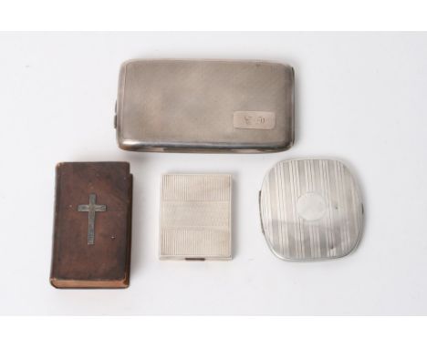 A large silver cigarette case, two silver compacts and a silver mounted bible 