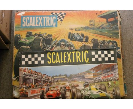 A box scalextric Grand Prix 50 set (not original cars in box) together with a boxed scalextric set 1 track pack 