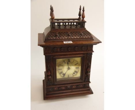 A late 19th to early 20th century Walnut cased German mantle clock with square brass dial by Winterhalder &amp; Hofmeier stri
