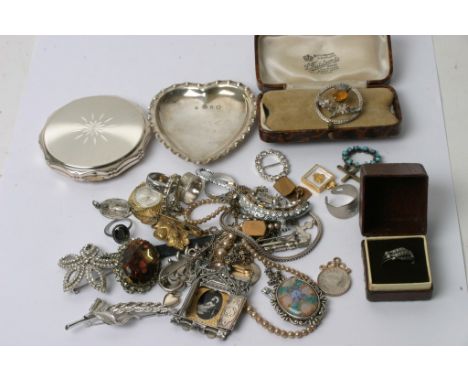 A small silver pin dish together with an assortment of various costume jewellery and a powder compact