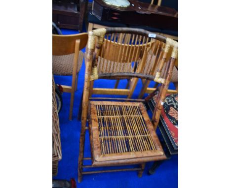 A vintage bamboo chair in the Oriental style