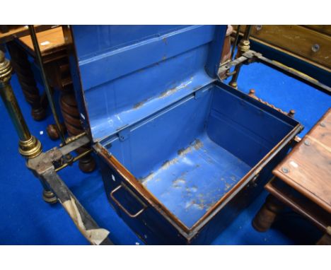 A vintage tin trunk, with broken catch