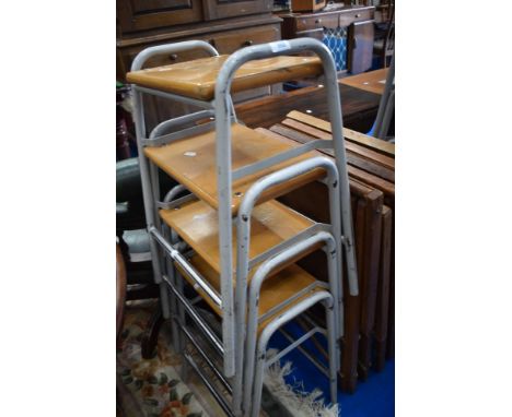 A set of four vintage lab/school stools