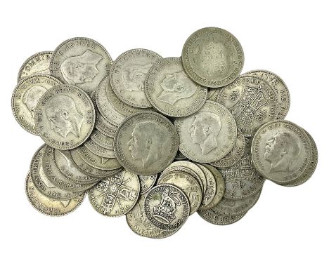 Approximately 500 grams of pre 1947 Great British silver coins, including halfcrowns, florin and one shillings