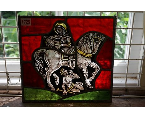 A stained and leaded glass panel of St Martin of Tours,&nbsp;27.5 x 29cm.&nbsp; 