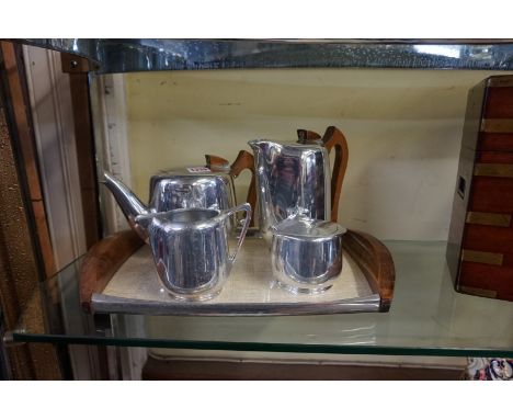 A vintage Picquot ware four piece tea set and tray, the tray 39.5cm wide. 