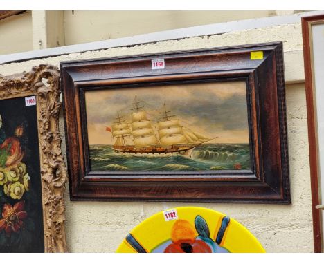 (ML) TBH, 20th century, a clipper in choppy seas, monogrammed, oil on panel, 19 x 39.5cm. 