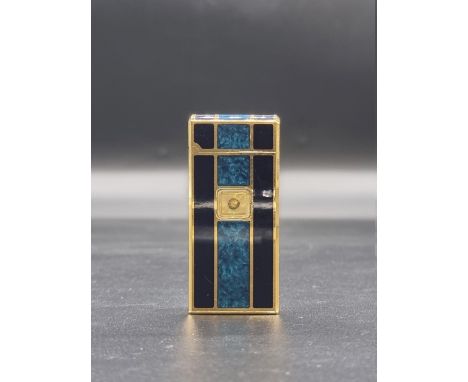 A vintage Colibri gilt metal and blue lacquer lighter,&nbsp;6.5cm high. 