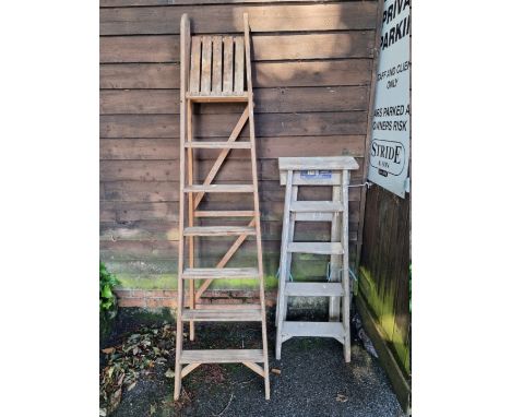 Two old wood folding step ladders.&nbsp; 