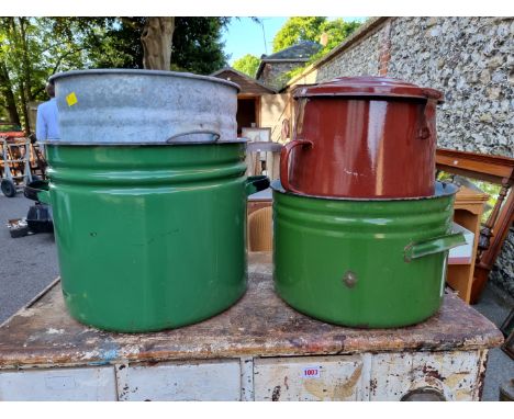 Three enamel pots; together with a metal twin handled pot. 