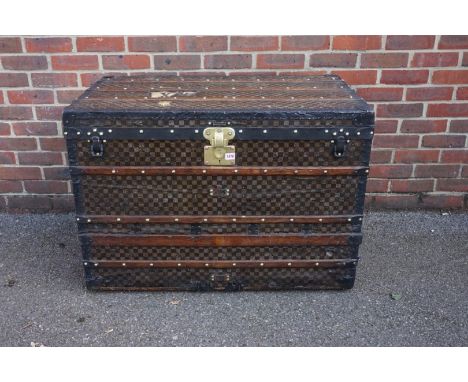 A large late 19th century Louis Vuitton 'Damier' pattern trunk, circa 1888-96, labelled to the interior and numbered 101571, 