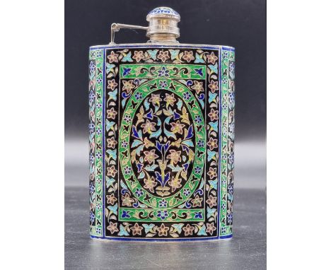 An Islamic champleve enamel hip flask, stamped&nbsp;'92.5', with stylized floral decoration, 14cm high. 