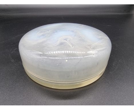 A rare R Lalique 'Houppes' pattern opalescent glass powder box and cover,&nbsp;14cm diameter.&nbsp; 