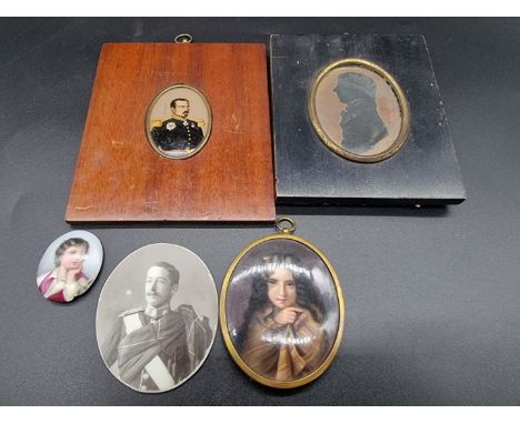 A small collection of portrait miniatures and similar,&nbsp;to include porcelain and glass examples, largest 8 x 6.5cm oval, 