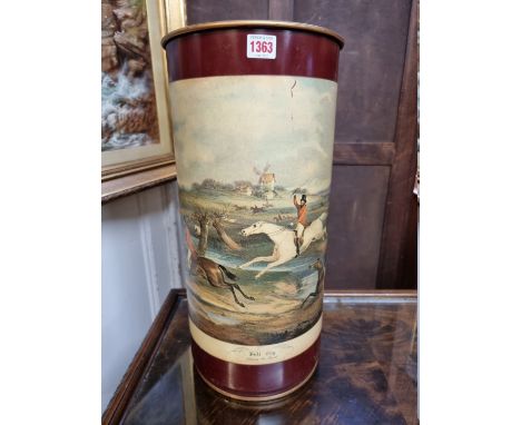 A vintage toleware stick stand,&nbsp;printed with a steeple chase scene, 50.5cm high. 