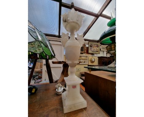 An alabaster table lamp, height excluding fitting 55cm. 