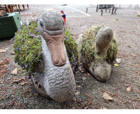 A painted duck planter;&nbsp;together with a smaller painted duck planter.&nbsp; 
