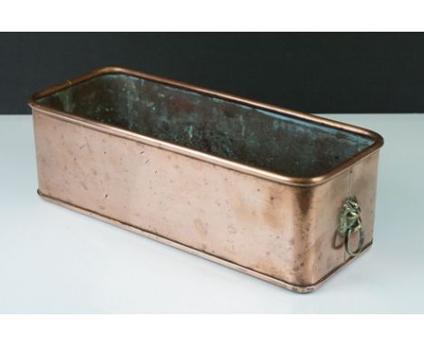 Copper rectangular Planter with Brass Lion Mask ringed handles, 35cm long x 11cm high 