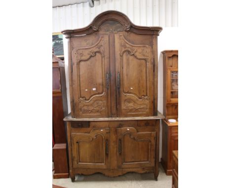 Large French Oak Armoire Cupboard, the upper section with shaped moulded cornice over two cupboard doors opening to an empty 