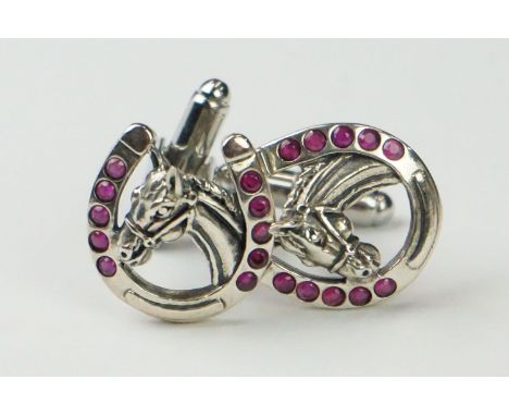 Pair of silver and ruby horseshoe cufflinks 