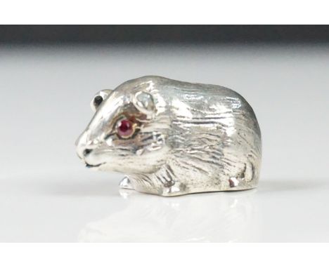 Silver guinea pig figure, with ruby eyes 