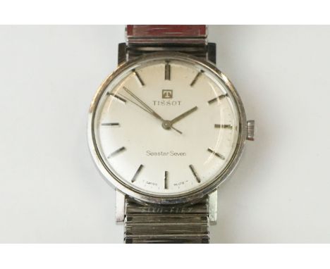 Gents Tissot Seastar Seven stainless steel watch with silvered dial, baton hour markers, and a replacement expandable bracele