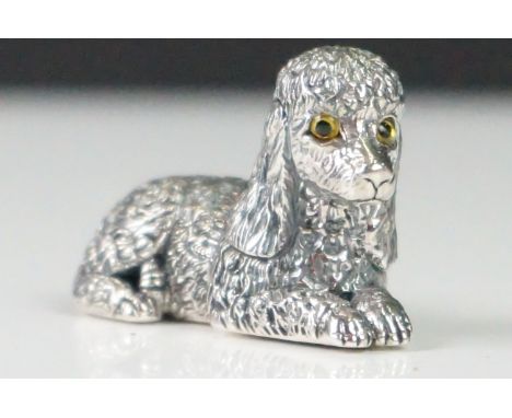 Silver cast poodle dog figure, with ruby eyes 