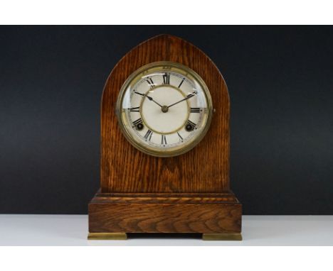 Early 20th century American Arched Top Oak Cased Mantle Clock by Waterbury Clock Co, with key, 31cm high 