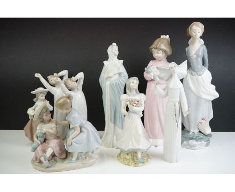 Nine Spanish Figurines including Lladro Figurine 36cm high, Lladro Nun, Two Lladro Yawning Boys,  Three Nao Figurines and Two