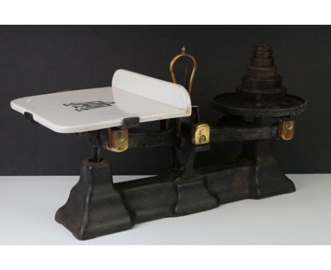 Set of Late 19th / Early 20th century Cast Iron and Brass Avery Scales, the white ceramic plate marked ' Avery's ', 48cm long