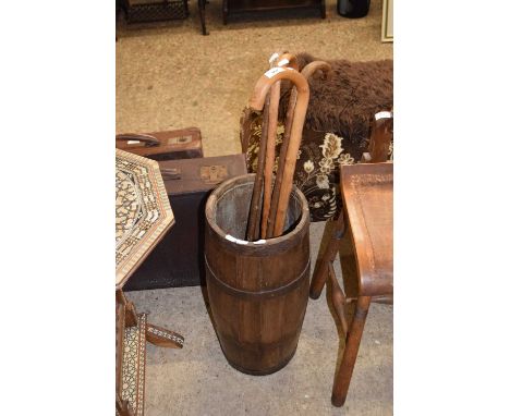 Barrel formed stick stand and various walking sticks