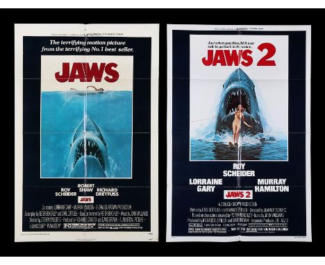 A pair of US One-Sheets for Steven Spielberg's "Jaws" (1975) and the sequel, "Jaws 2" (1978).27" x 41" (69 x 104 cm)Additiona