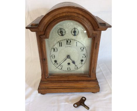 Early 20th century oak cased domed top mantel clock