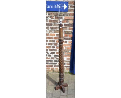 Wooden standard lamp converted from a bedpost 