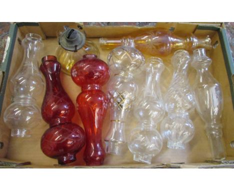 Various oil lamp chimneys and an oil lamp