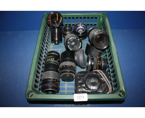 A large quantity of Camera Lenses including Vivitar, Skylight, Practicar, etc.