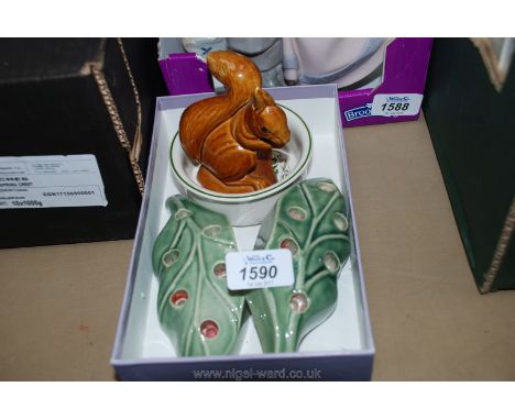 Two leaf candle holders, Wade bowl and Poole squirrel