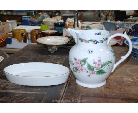 A Royal Worcester Jug decorated with herbs and a Royal Worcester oval Dish, white ground with gilt rim