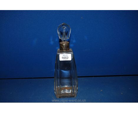 An Art Deco liqueur Decanter with silver neck band.