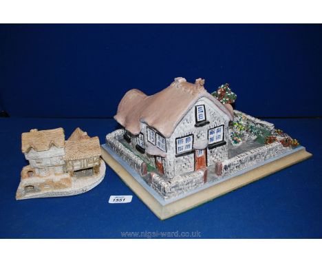 A David Winter ceramic Cottage and a large model of a Cottage