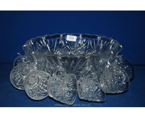 A large glass Punch Bowl Set with cups and hooks 