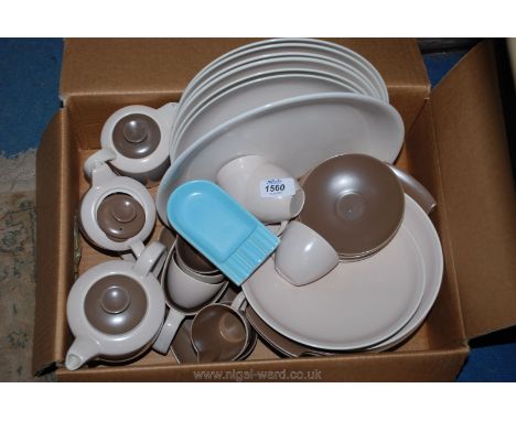 A quantity of Poole pottery including coffee cups and saucers, coffee pots, plates,etc