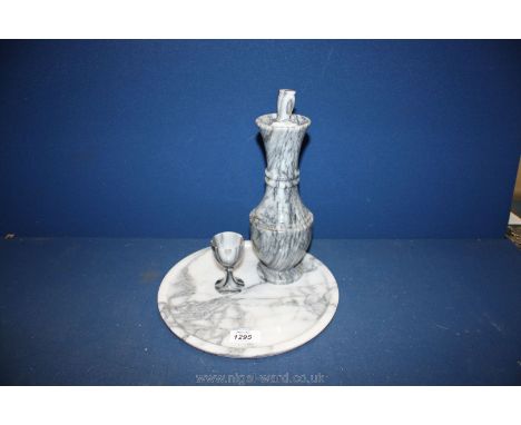 A small marble Tray with marble liqueur decanter and small goblet.