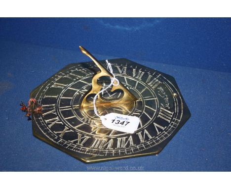 An octagonal Brass Sundial.
