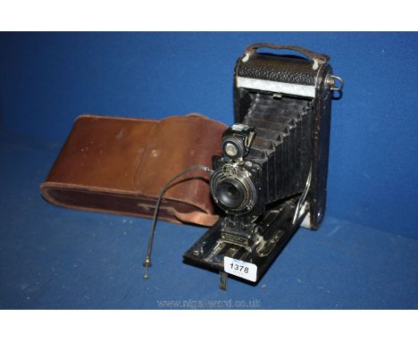 A Kodak Nos. 2C autographic Junior folding bellows Camera with leather case