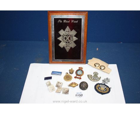 A Black Watch plaque and miscellaneous military Badges, buttons and enamel badges