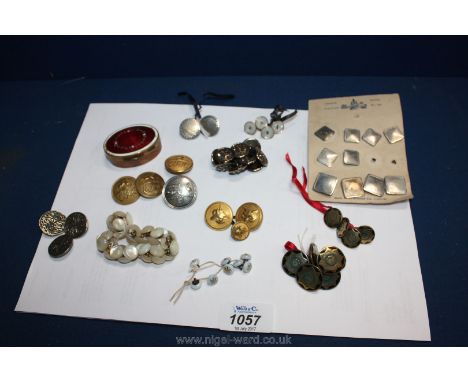 A quantity of interesting Buttons including Indian enamel buttons, French milk glass buttons, mother of pearl buttons, etc.