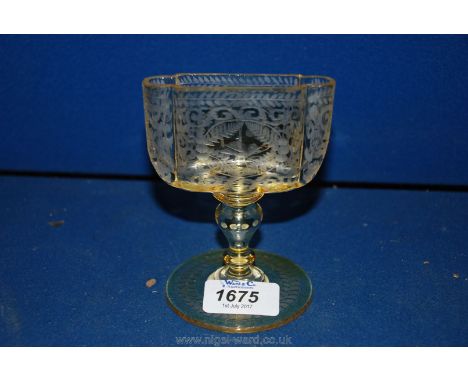 An Uranium glass Art Deco engraved card/cigarette Holder on knop stem decorated with bird and flowers